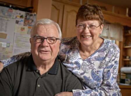 Portrait of Jerry W. and his wife Cindy smiling at the camera