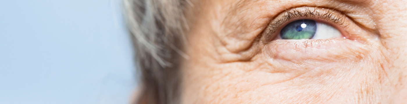 Close up on an older woman's blue eye