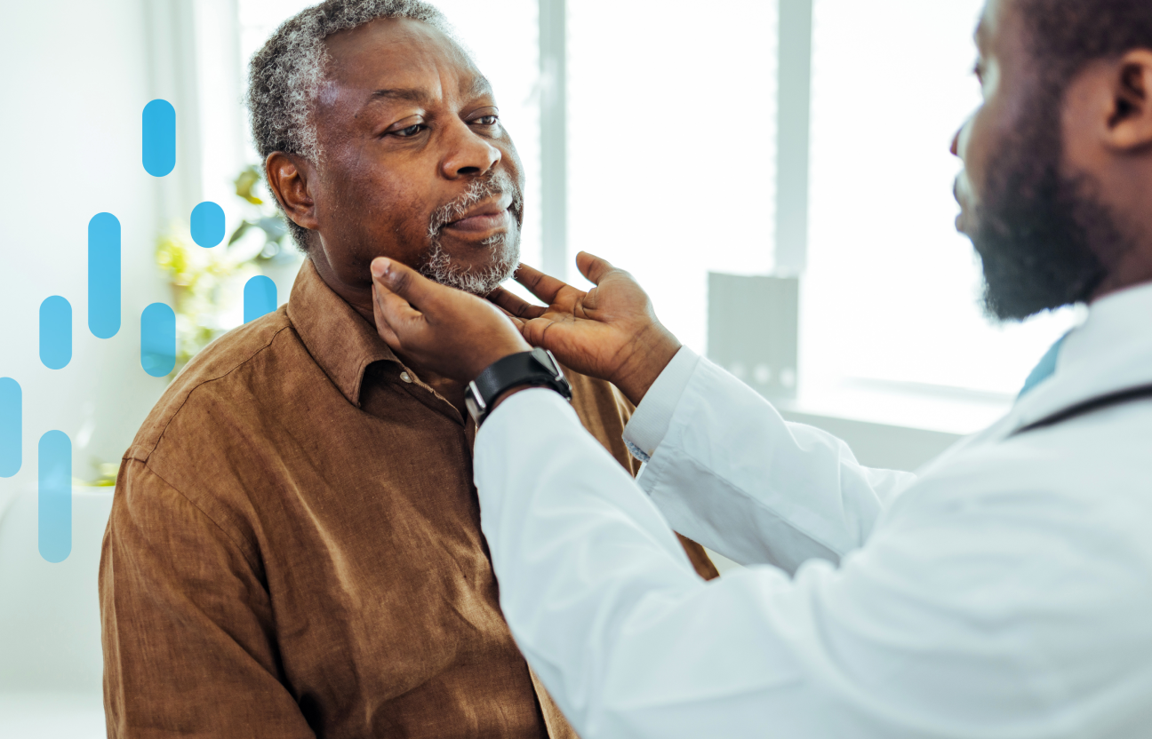 A physician checks the lymph nodes of an older man